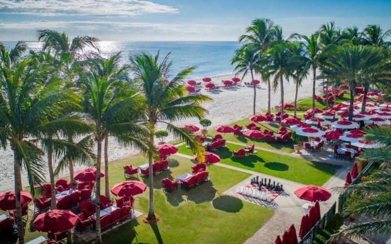 View of the pristine beach and turquoise waters from Acqualina Resort in Miami Beach.