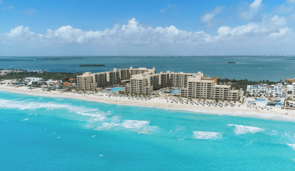 The Royal Sands Resort - Family-friendly beachfront resort framed by palm trees and white sand